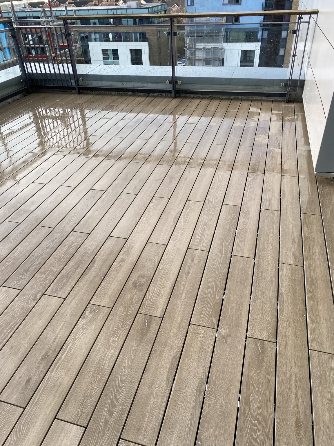 Completed wood-effect porcelain decking terrace